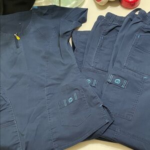 Spread good cheer, Blue Scrub Set with Pockets. XSp.